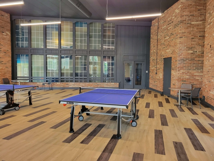 large room with a ping pong table